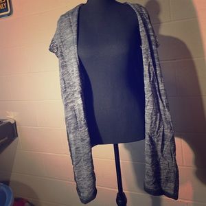 A pretty gray and black sparkly vest